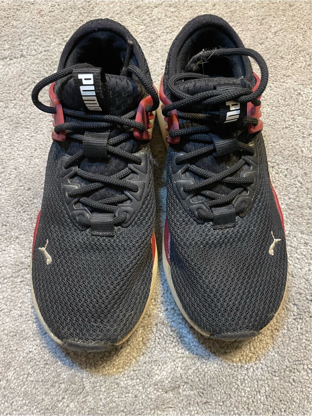 Puma red white and black running shoes girls size 4.5